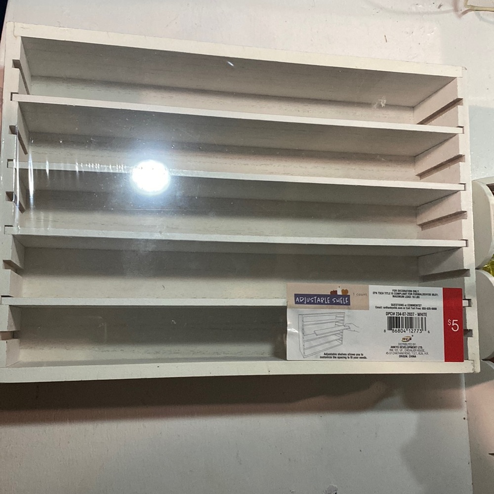 Target’s Adjustable shelf 13 1/2” long /9 1/5” wide